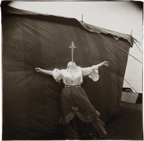 Copyright © The Estate of Diane Arbus, Albino sword swallower at a carnival, Md., 1970